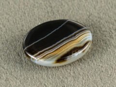 Sulemani Hakik 10.79 Carat back view showing flat underside and banding