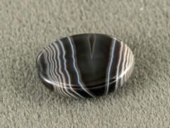 Sulemani Hakik 6.81 Carat back view showing flat underside and banding