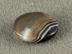 Sulemani Hakik 7.41 Carat back view showing flat underside and banding