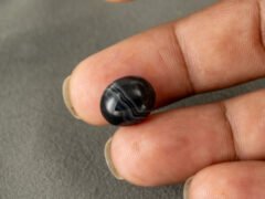 Sulemani Hakik 7.84 Carat in-hand size reference 13.6 x 12 mm