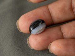 Sulemani Hakik 9.34 Carat in-hand size reference 15.8 x 12 mm