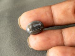 Natural Sulemani Hakik Agate Stone 9.57 Carat in-hand perspective one