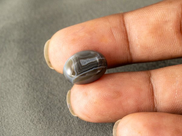 Natural Sulemani Hakik Agate Stone 9.57 Carat in-hand perspective one