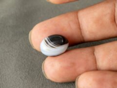 Sulemani Hakik 9.57 Carat in-hand size reference 16 x 12 mm