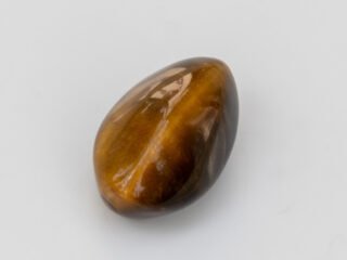 natural tiger eye stone 4.93 carat eye shape golden brown front view