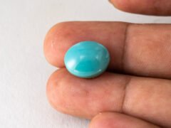 American firoza 11.10 carat turquoise in hand size reference