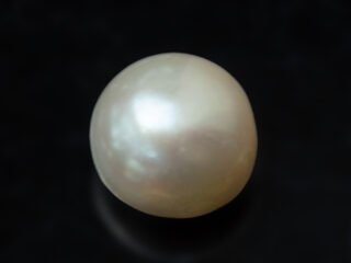 Cultured Pearl Moti 4.96 carat top view creamish white round shape