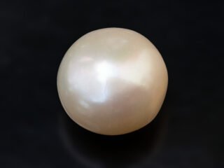 Cultured Pearl Moti 4.98 carat top view creamish white round shape