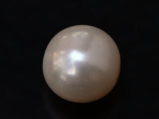 Cultured Pearl Moti 5.01 carat top view creamish white round shape