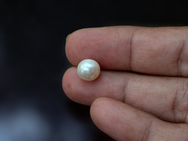 Cultured Pearl Moti 5.01 carat in hand actual size