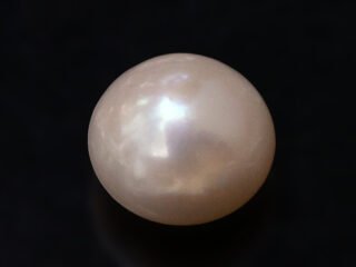 Cultured Pearl Moti 5.52 carat top view creamish white round shape