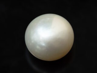 Cultured Pearl Moti 5.63 carat top view creamish white round shape