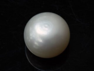 Cultured Pearl Moti 5.86 carat top view creamish white round shape