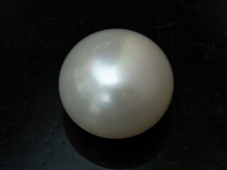 Cultured Pearl Moti 8.32 carat top view creamish white round shape
