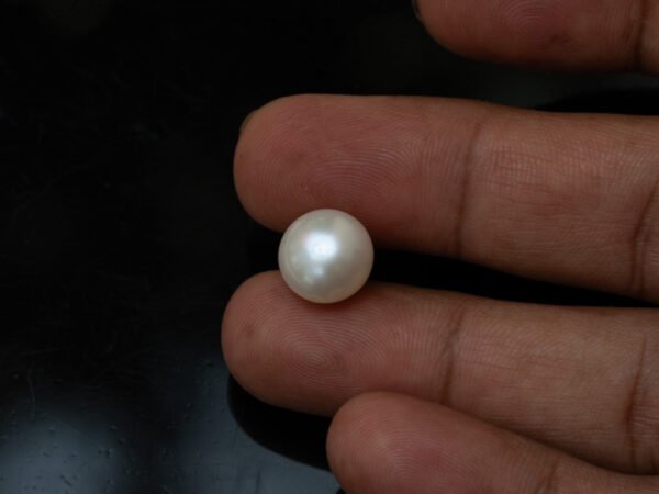 Cultured Pearl Moti 8.32 carat in-hand actual size