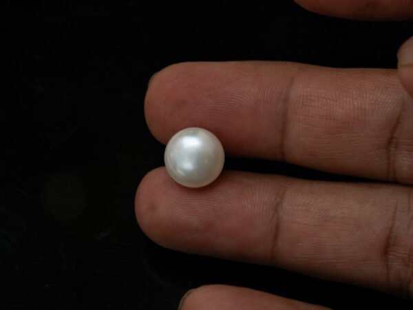 Cultured Pearl Moti 8.41 carat in-hand actual size
