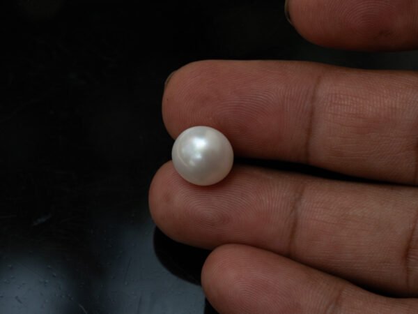 Cultured Pearl Moti 8.57 carat in-hand actual size