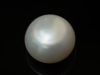 Cultured Pearl Moti 8.88 carat top view creamish white round shape