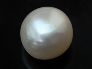 Cultured Pearl Moti 8.97 carat top view creamish white round shape