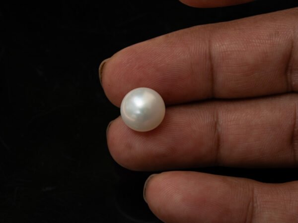 Cultured Pearl Moti 9.02 carat in-hand actual size