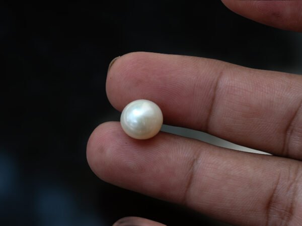 Cultured Pearl Moti 9.08 carat in hand actual size
