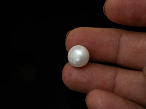 Cultured Pearl Moti 9.28 carat in-hand actual size