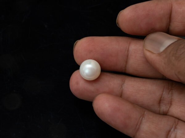 Cultured Pearl Moti 9.33 carat in-hand actual size