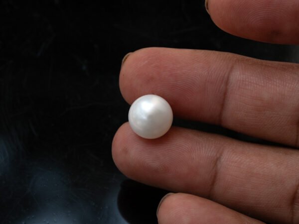 Cultured Pearl Moti 9.62 carat in hand actual size