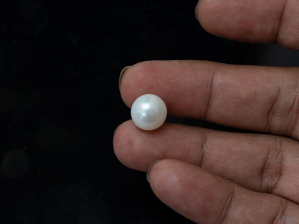 Cultured Pearl Moti 9.80 carat in-hand actual size