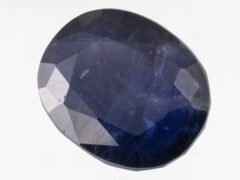 Iolite Stone Kaka Neeli 10.91 carat side view oval mix cut