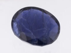 Iolite Stone Kaka Neeli 11.38 carat side view oval mix cut