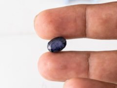 Natural Kaka Neeli Stone Iolite 4.46 carat in hand size reference