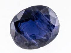 Natural Iolite Stone Kaka Neeli 4.76 carat top view blue oval mix cut