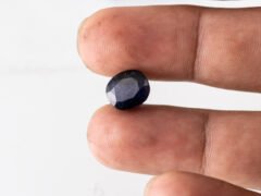Natural Kaka Neeli Stone Iolite 5.24 carat in hand size reference