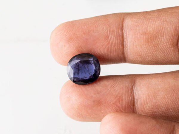 Natural Kaka Neeli Stone Iolite 5.33 carat in hand size reference