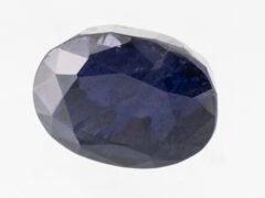 Natural Iolite Stone Kaka Neeli 7.04 carat top view blue oval mix cut