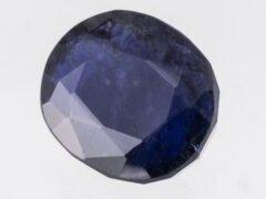 Iolite Stone Kaka Neeli 7.74 carat side view oval mix cut
