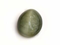 Quartz Cats Eye Lahsuniya 5.48 Carat side view gray cabochon