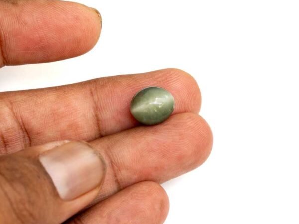 Quartz Cats Eye Lahsuniya 6.90 Carat in-hand view gray cabochon