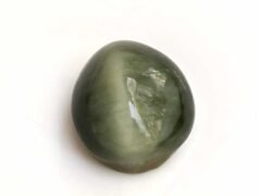 Quartz Cats Eye Lahsuniya 8.21 Carat side view gray cabochon