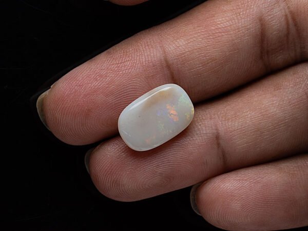 Australian Fire Opal Stone 7.25 carat in hand view