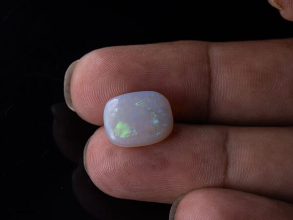 Australian Fire Opal Stone 3.73 carat in hand view
