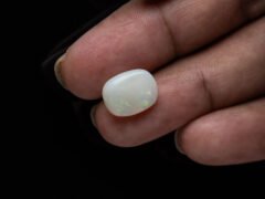 Australian Fire Opal Stone 4.36 carat in hand view