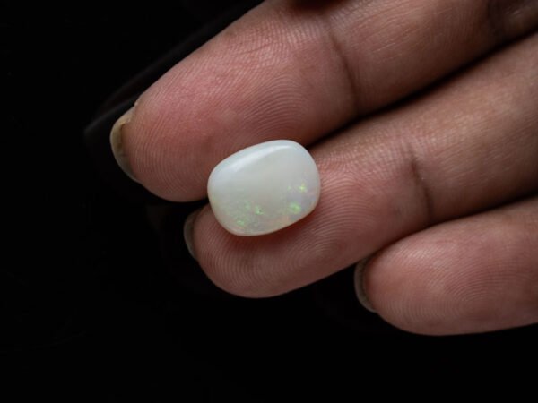 Australian Fire Opal Stone 4.36 carat in hand view