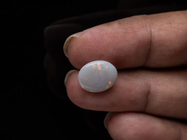 Australian Fire Opal Stone 3.27 carat in hand view