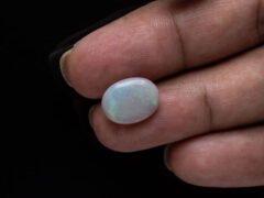 Australian Fire Opal Stone 3.8 carat in hand view