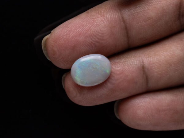 Australian Fire Opal Stone 3.8 carat in hand view