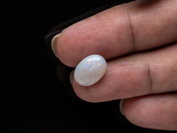 Australian Fire Opal Stone 3.16 carat in hand view