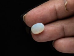 Australian Fire Opal Stone 3.64 carat in hand view