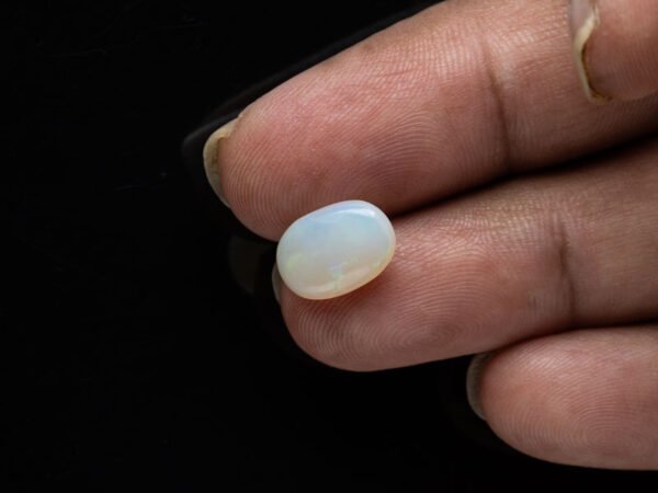 Australian Fire Opal Stone 3.64 carat in hand view
